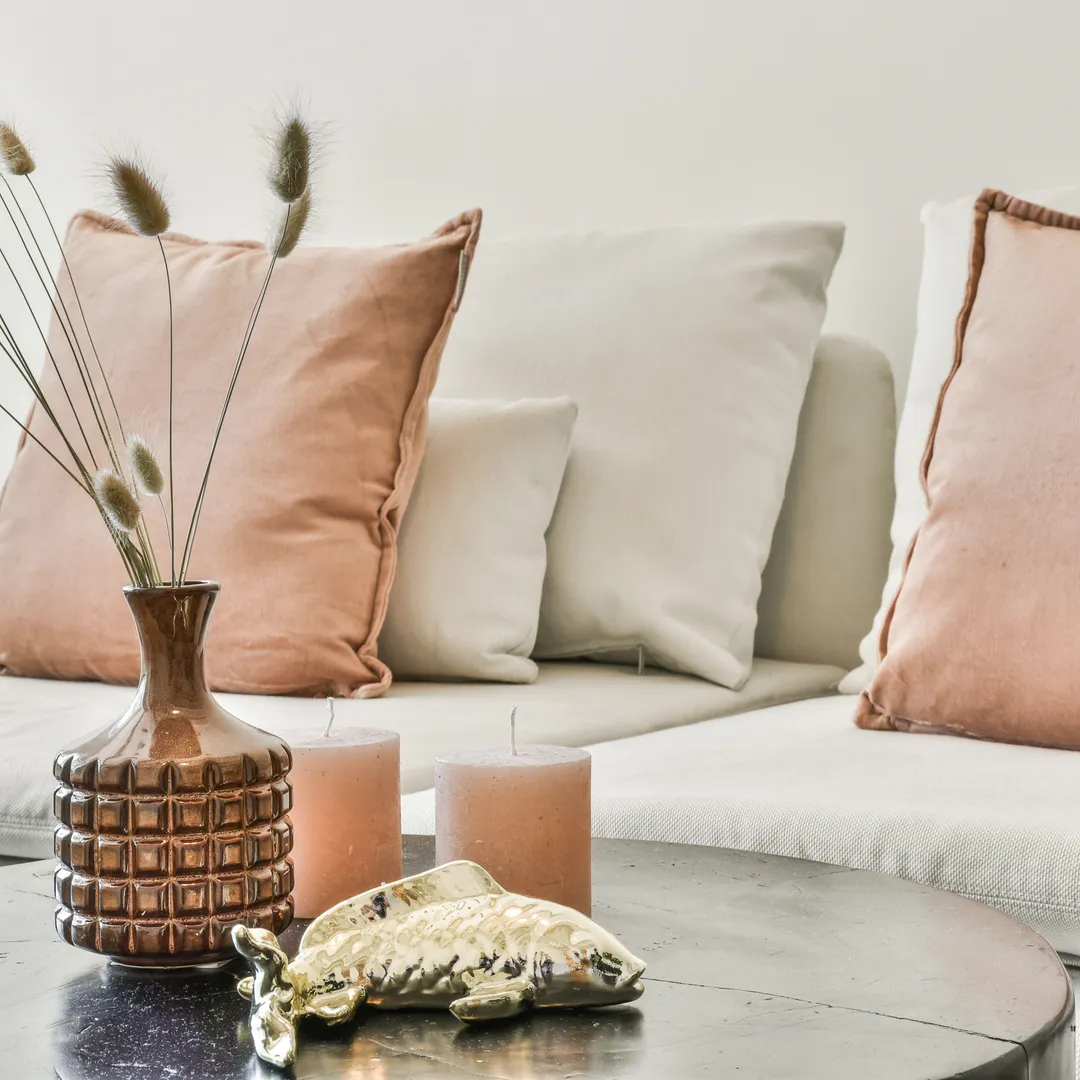 Styled interior with terracotta cushions